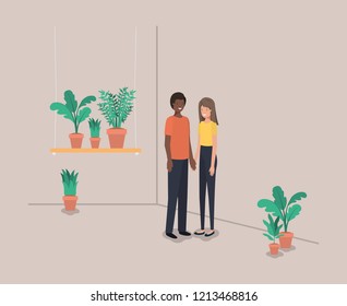 couple with houseplants in shelf