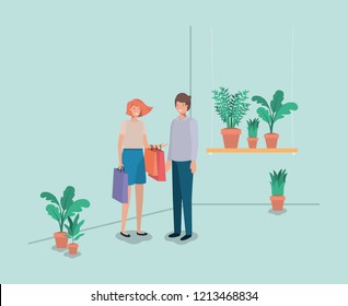 couple with houseplants in shelf
