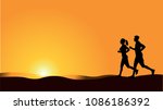 couple jogging in morning silhouette