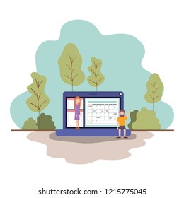 couple with laptop computer in landscape