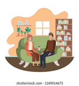 couple in living room drinking coffee