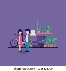 couple in the living room with houseplants and bicycle