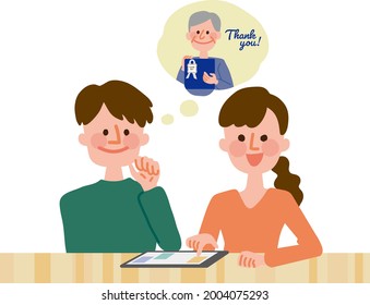 A couple looking for a present for Father's Day online