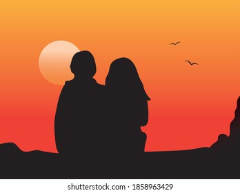 Couple in love admires sunset