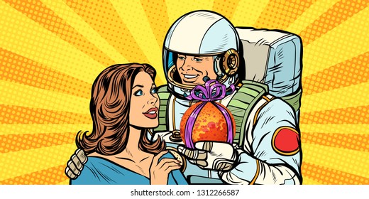 Couple in love. Astronaut gives a woman Mars. Pop art retro vector illustration drawing kitsch vintage