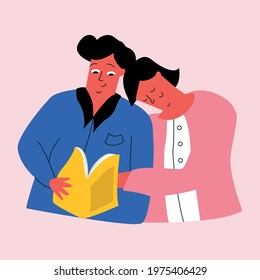 A couple in love embraces. The woman leaned her head on the shoulder of her husband, boyfriend, friend. A man reads his woman a book, a magazine. Spending time together