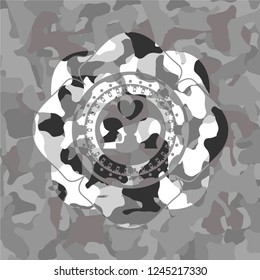 couple in love icon inside grey camouflage emblem