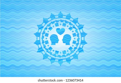 couple in love icon inside light blue water emblem.