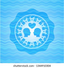 couple in love icon inside light blue water badge background.