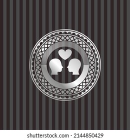 couple in love icon inside silver badge. 