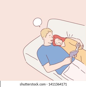 Couple in love lying in sofa, hugging and reading books after waking up, enjoying the weekend morning. Hand drawn style vector design illustrations.