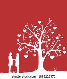 Couple in love near a magic tree.