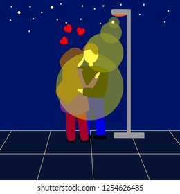 A couple in love stands under a lantern