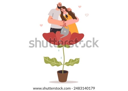 Couple in love takes care of creating strong family, watering plants to achieve reliable relationship. Happy man and woman enjoy married life and opportunity to lead peaceful family life