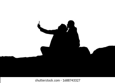 couple of lovers make a selfie. Girl and guy look at the phone and make a photo	