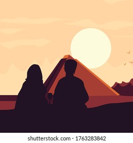 a couple of lovers sitting at dusk facing the pyramid
