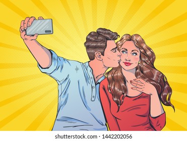 Couple of lovers take a selfie on the camera of their phone. Social media, relationship theme,pop art style. Guy kisses girl on the cheek and takes a picture, she is looking at the camera and smiling.