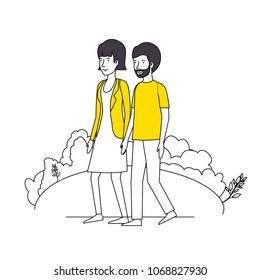 couple lovers with yellow clothes walking in the park