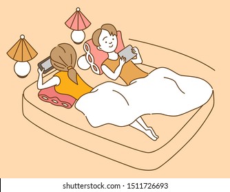 Couple lying in bed and looking at phone. Flat design vector illustration.