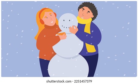 Couple making snowman. Winter leisure activity concept. Holidays vacation 