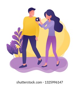 Couple male female traveling and walking with DSLR camera in park with plants,  summer honeymoon. Trendy gradient flat vector illustration for web landing page, banner, presentation, social media.