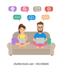 couple man and woman sitting on the sofa in yoga poses with notebooks surfing internet