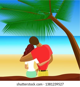 couple on the beach under a palm tree