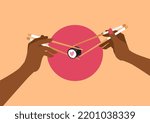 Couple on a date at a sushi bar. Hands holding chopsticks. Maki roll with heart symbol inside