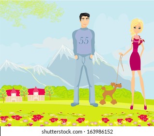 couple on a walk with the dog