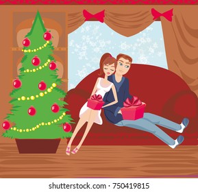 couple opens a gift box on Christmas