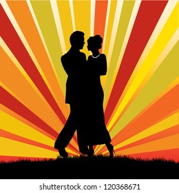couple out in the evening with bright ray background