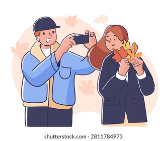 Couple outdoors as man snaps a smartphone picture of woman holding fall leaves, casual clothing, soft outline shading. Captures memory, romance, season change, nostalgia, and relationship bonding. Cartoon vector illustration.
