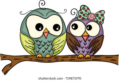 Couple owls on branch
