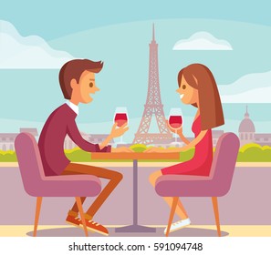 Couple At Parisian Cafe  On Date In Paris. Sweet Happy Young Couple Having Romantic Dinner With Glasses Of Red Wine On Date.Drink Wine.