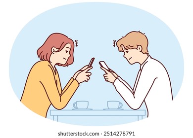 Couple with phones sits in cafe, addiction to social networks and internet chatting, not paying attention to interlocutor. Concept of social problems associated with digital addiction to gadgets