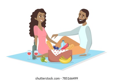 Couple at picnic. African couple sitting on blanket with food on white.