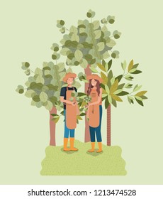 couple planting tree in the park