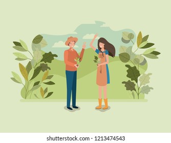 couple planting tree in the park