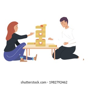 Couple playing table game at home. Cozy atmosphere with board game and family. Cartoon characters playing with logic game weekend. People making wooden tower from bricks. Blocks stacked in high tower