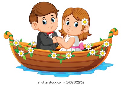 the couple are posing on the beautiful boat with the flowers around it
