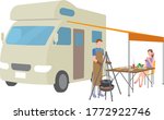 Couple preparing food in a camper van