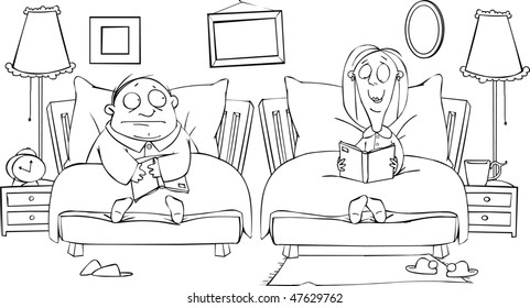 Couple reading in bed