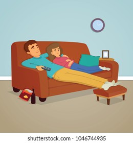 Couple relaxing on sofa watching TV