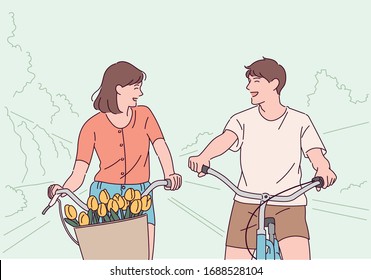 A couple is riding a bicycle in the park. hand drawn style vector design illustrations. 