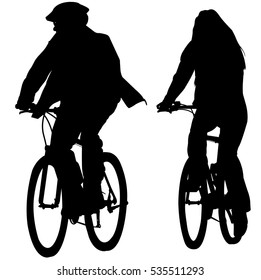 couple riding bicycles silhouettes - vector