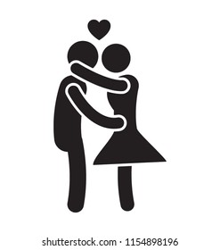 
Couple in romantic gesture of kissing 
