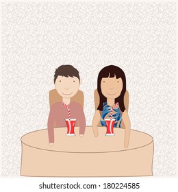 couple sharing a drink on the table