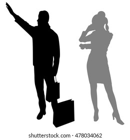 couple with shopping bags calling a Cab