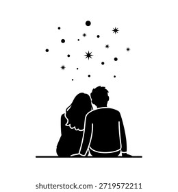Una pareja se sienta juntos mirando un cielo nocturno estrellado.