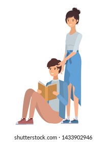 couple sitting with book in hands